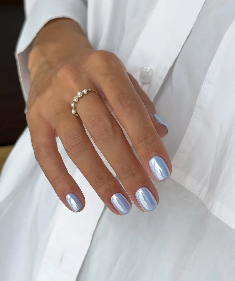 65 найкращих фото-ідей новорічного манікюру 2026: тренди, кольори, декор blue 1, 50, 65 найкращих фото-ідей новорічного манікюру 2026: тренди, кольори, декор Манікюр 2026